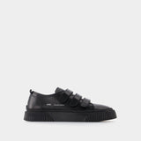 Low-Top Velcro Sneakers in Black Leather