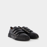 Low-Top Velcro Sneakers in Black Leather