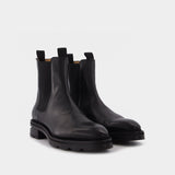 Low-Heeled Andie Cut-Out Boots in Black Box Calf Leather