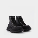 Tread Slick Sneakers in Black and Silver Leather