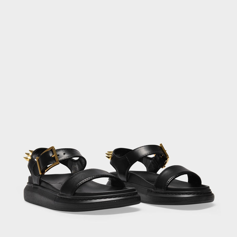 Sandals in Black and Gold Leather